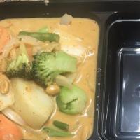 Massaman Curry · Sweet thai curry with potatoes, carrots, onions and peanuts in coconut milk.