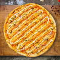 Ranch Rush Vegan Pizza  · Enjoy a pizza topped with vegan chicken, vegan bacon, ranch dressing, and vegan cheese on to...