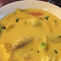 Chupe De Camarones · *Highly Recommended* 
Traditionally Peruvian milk based soup with rice, potatoes, and shrimp