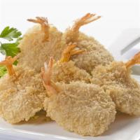 Butterfly Shrimp · Crispy butterfly shrimp made to perfection breaded and served with sweet chili sauce.