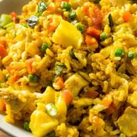 The Pineapple Fried Rice · Customer's choice of protein with pineapples, onions and scallions.