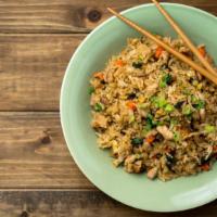 Spicy Basil Fried Rice · Customer's choice of protein on with spicy basil sauce and fried rice.