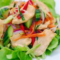 Thai Salad · Classic Thai salad with green salad, bean curd and peanut dressing.