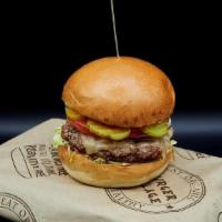 Village Bison Burger · Grass-fed, antibiotic and hormone free, hand formed patty.