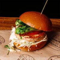 Village Salmon Burger · Natural, hormone and antibiotics free.