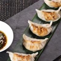 Assorted Dumplings · Six pieces of delicious steamed dumplings with various stuffings.