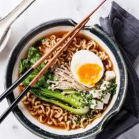 Japanese Udon Noodle Soup · A savory, seasoned bowl of soup with warm udon noodles.