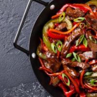 Beef With Scallions · Pieces of marinated beef sautéed with fresh scallions.