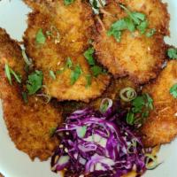 Coconut Shrimp · Red cabbage, toasted sesame seed, cilantro, scallions, hula sauce