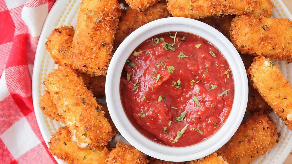 Mozzarella Sticks (6) · Our delicous mozzarella sticks are deep fried into  cheesy creamy perfection and topped off with the signature flavorfull pizza sauce.