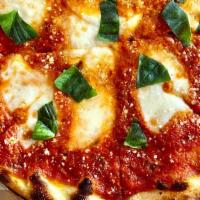 Margherita · plum tomato sauce, fresh mozzarella, parmigiano, basil