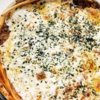 Mamma'S Lasagna · traditional beef-pork-veal ragu, ricotta, mozzarella