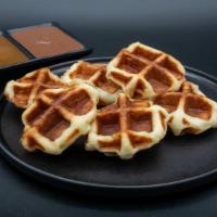 Les Petits · Traditional mini waffles made with brioche yeast dough and studded with pearl sugar. Make su...
