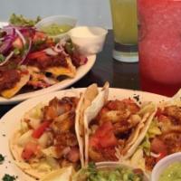 Fish Tacos (3) · Lettuce, onions, tomatoes, and fresh fish, served with a choice of Guacamole or Teriyaki sau...