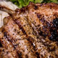 Grilled Pork Chops · Grilled to perfection & served with mashed potato and broccoli.