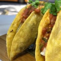 Hard Shell Tacos (2) · Folded crisp corn tortillas filled with shredded chicken, beef, or pork. Topped with cheese,...