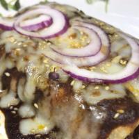 Enchiladas Mole · 2 soft corn tortillas filled with chicken or cheese & baked in a rich chocolate mole sauce. ...