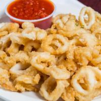 Calamari Fritti · Pan fried to perfection and served with fra diavolo sauce..