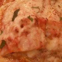 Lasagna Casareccia · Freshly baked homemade lasagna layered with ground beef, fresh mozzarella, and ricotta chees...
