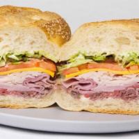 American Sandwich (Cold Cut) · Roast beef, turkey, ham, American cheese, lettuce, tomato and mayo on a hero. A crowd favori...