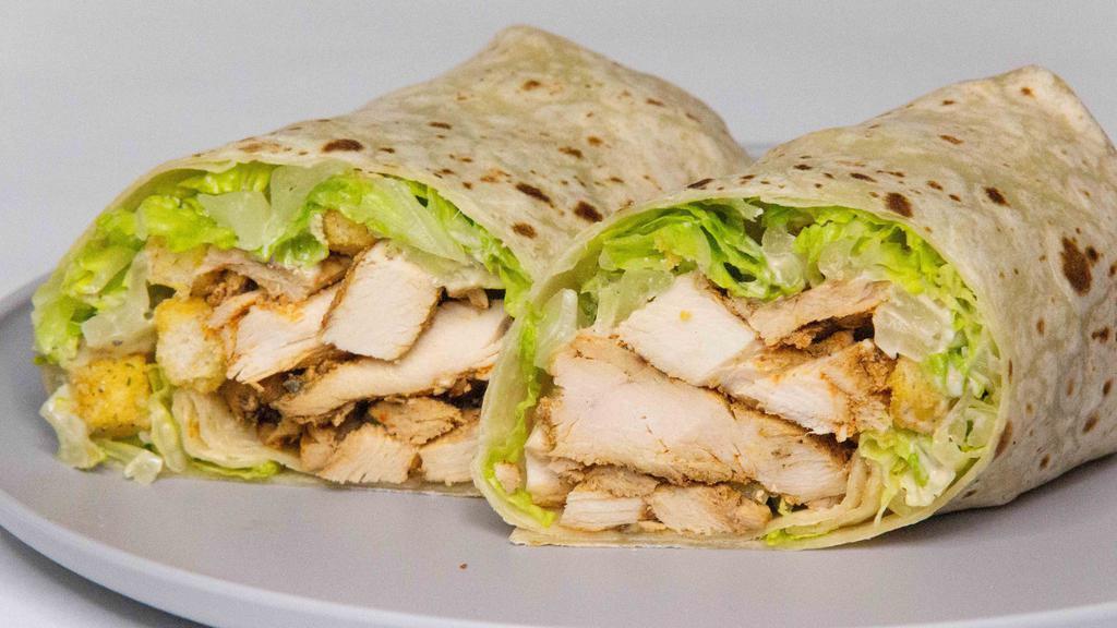 Chicken Caesar Wrap · Grilled chicken, romaine lettuce, croutons, Parmesan cheese, and Caesar dressing on wrap.