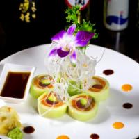Naruto Roll · Tuna, salmon, yellowtail, avocado and caviar rolled with cucumber wrap paper.