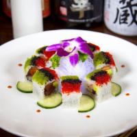 Toki Spicy Tuna Roll · Tuna marinated with chef’s spicy sauce outside, inside with cucumber and avocado.