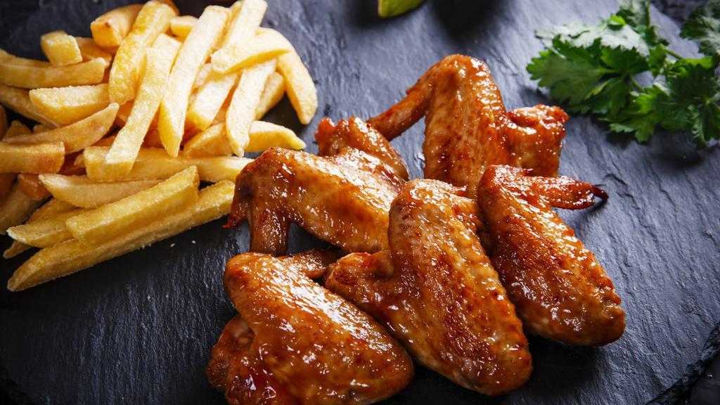Honey Bbq Jumbo Wings · Jumbo sized chicken wings smothered in sweet honey barbeque sauce.