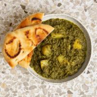 Saag Aloo · Fresh chopped spinach and potatoes cooked with special herbs and spices.