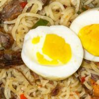 Indomie[Ramen] · noodles made with roasted vegetables ,accompanied with eggs and meat