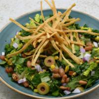 Market Chopped Salad · Corn, poblano, pinto beans, red onion, tomato, olive, queso, tortilla strips. Cumin Vinaigre...