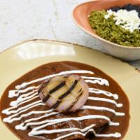 Enchiladas De Queso · Menonita, Oaxaca, and cotija cheeses. Topped with grilled red onion and guajillo salsa. Glut...