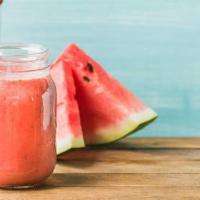 Mucho Melon Smoothie · Melon, fruit juice, banana, yogurt and agave nectar.