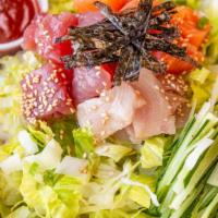 Gochujang Bowl · Rice, lettuce, cucumber, Ahi, salmon, hamachi gochujang sauce.