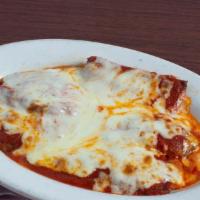 Chicken Parmigiana · Chicken, marinara sauce, mozzarella cheese. Excellent dish to share. Comes with a side. Usua...