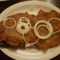 Breaded Steak Cutlets · Bistec empanizado.