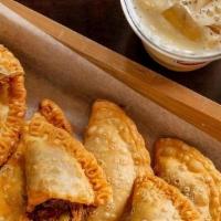 Pastelillos Chicken · Pastelillos are small turnovers made with a thin dough with chicken