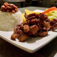 Especial De Chuleta · Boneless Pork Chop served with rice, beans, plantains and salad all in one plate