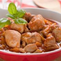 Pollo Guisado · Bone in chicken stew with carrots and potatoes