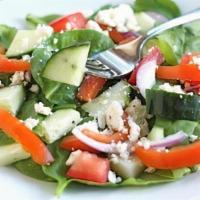 Spinach Salad · Popeyes salad of choice, A bed of crisp organic spinach with tomatoes, red onions, feta chee...