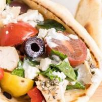 Greek Salad Pita · Romaine lettuce, tomatoes, organic cucumber, red roasted peppers, Greek feta. cheese & Kalam...