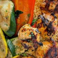 Chicken Kabob Entree · Served with basmati rice, our grilled vegetable mix, pita bread, dipping sauce and side salad
