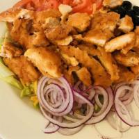 Spicy Tender Salad · Salad topped with chicken tenders dipped in hot sauce, cheddar cheese, black olives, tomatoe...