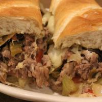 Prime Rib Bomber · 10 oz. of fresh sliced prime rib with grilled onions, peppers, mushrooms and provolone chees...