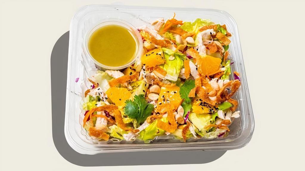Chinese Chicken Salad · Dairy-free. Roasted free-range chicken, marcona almonds, sesame seeds, carrots, crispy wontons, Valencia oranges, cilantro, mixed greens, sesame, and green onion dressing.
