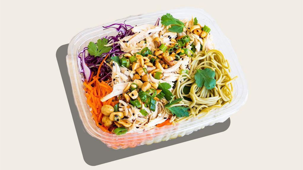 Green Tea Soba Noodle Salad With Sesame Chicken · Gluten-free*. Free-range sesame chicken, red cabbage, grated carrots, marinated peanuts, sweet Thai chili sauce, mint, cilantro, peanut sauce.