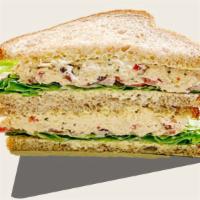 Off The Hook Tuna Sandwich · Wild caught albacore tuna, house-made lemon aioli, red bell peppers, cranberries, sliced alm...