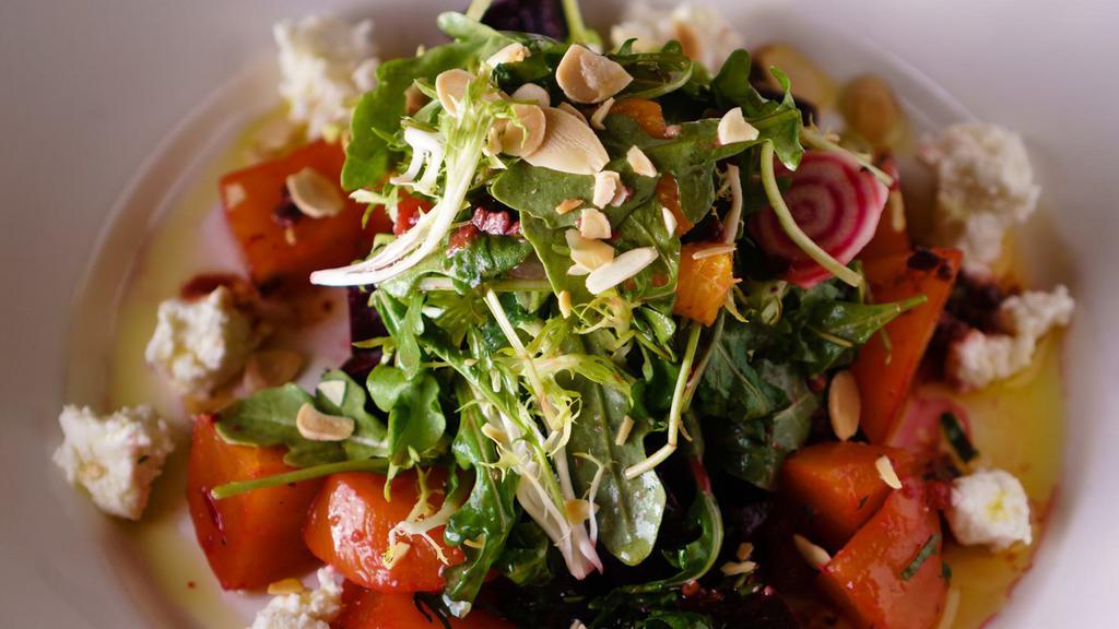 Roasted Beets · Goat cheese, citrus, toasted almonds, sun dried tomato vinaigrette