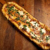 Margherita Pizza · 18 inches long. Fresh mozzarella, tomato and basil.