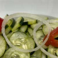 1/2 Lb. Cucumber Salad · Thinly sliced cucumbers in a mixture of vinegar and pepper.